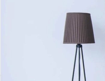 Wipe floor lamps and wall sconces from dust